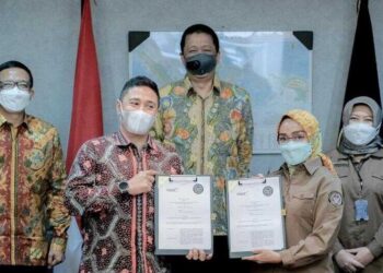 Gandeng Asyst Kembangkan Layanan Website Indonesia.Travel