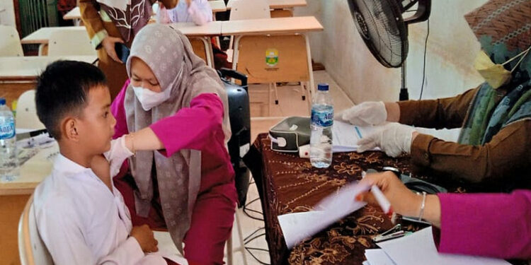 Kejar Target Hngga 100 Persen, Polres Muaro Jambi Buka Gerai Vaksin di Sekolah-sekolah