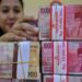 Rupiah Melemah Seiring Pasar Hindari Aset Berisiko