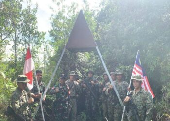 TNI dan TDM Patroli Bersama Patok Batas Negara Indonesia-Malaysia