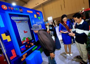 Keseruan Permainan Interaktif di Booth FIFGROUP Pada Ajang IMOS+ 2023