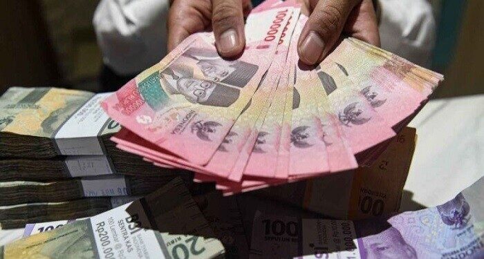 Tahan Suku Bunga BI Rate, Rupiah Anjlok
